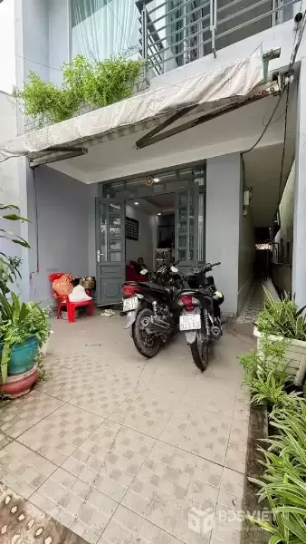 nhà q7 nở hậu 4,5x23, gần mặt tiền, sân trước sau, 2 phòng trọ riêng – 7,5 tỷ