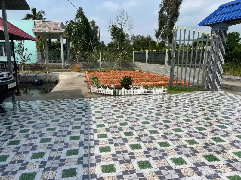 Bán nhà vườn thuỷ tạ xã Bình Đức tdt 709m2 có 2pn,1wc, sân oto giá 1,9 tỷ