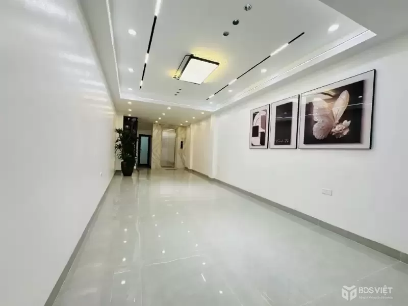 nguyễn văn huyên 48m x6 tầng thang máy 15,8 tỷ gara ô tô,ngõ thông kinh doanh